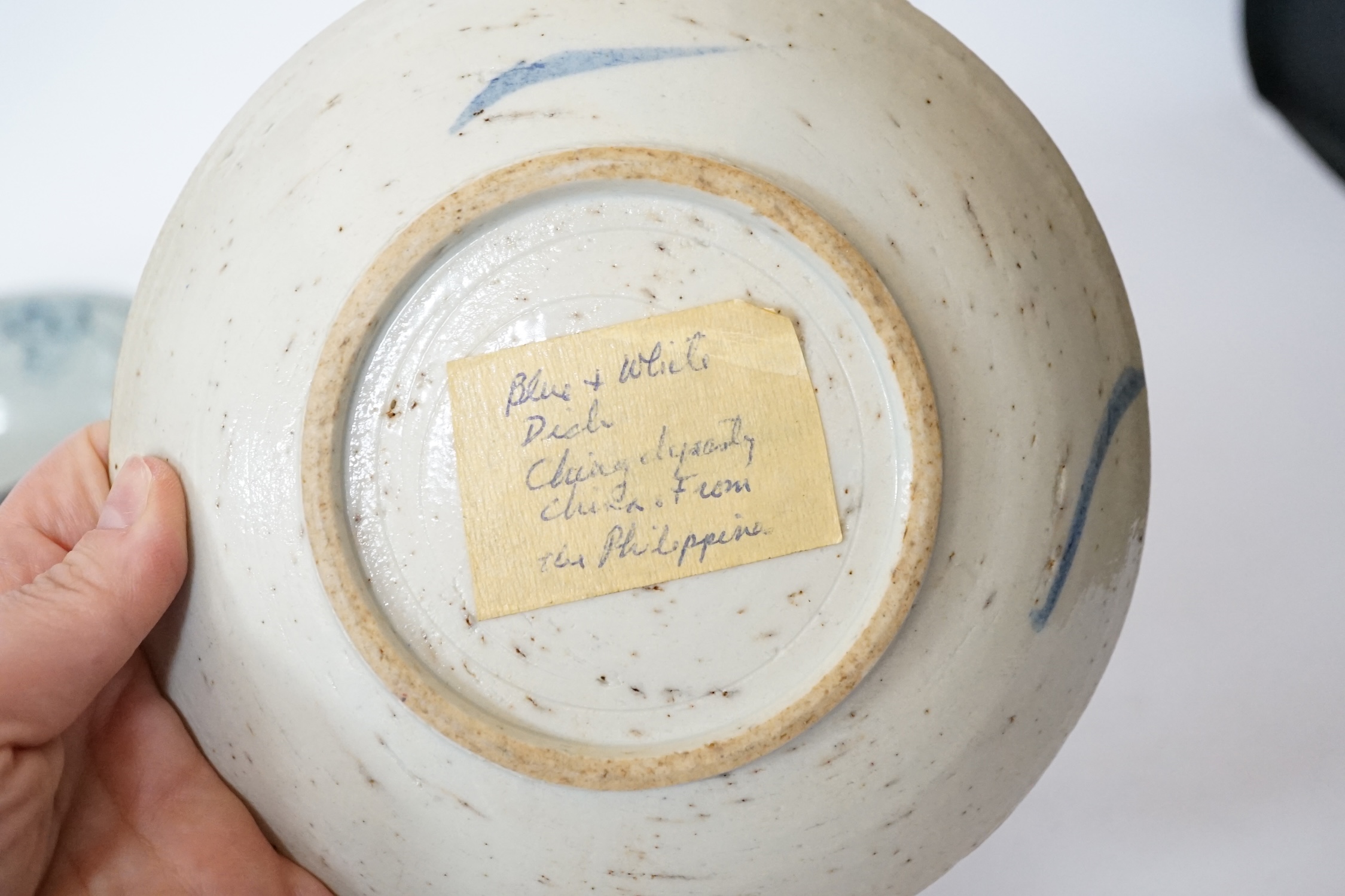 A Chinese Ming blue and white bowl and two Qing dynasty dishes, largest 17cm diameter